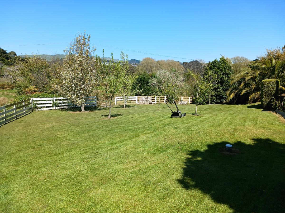 Large lifestyle property lawn freshly mowed