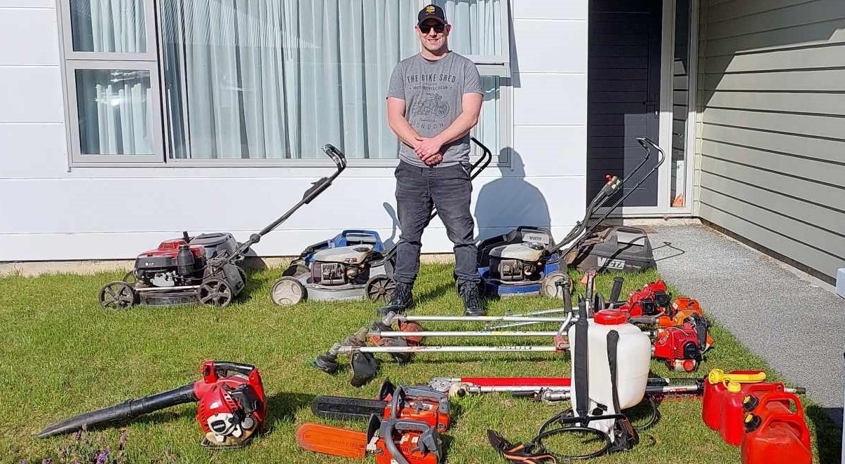 Kent Osborne, owner-operator of All Lifestyles Property Maintenance, with his full lineup of mowing and property maintenance equipment